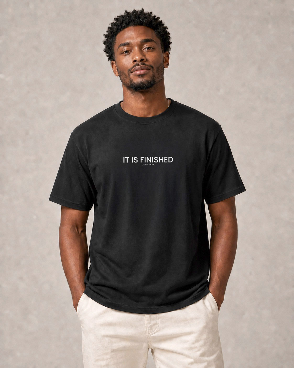 Model wearing the It Is Finished T‑Shirt